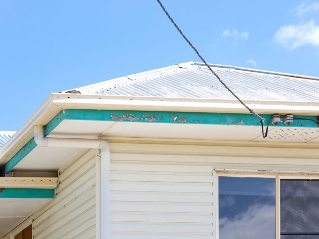 House Exterior peeling cracking paint